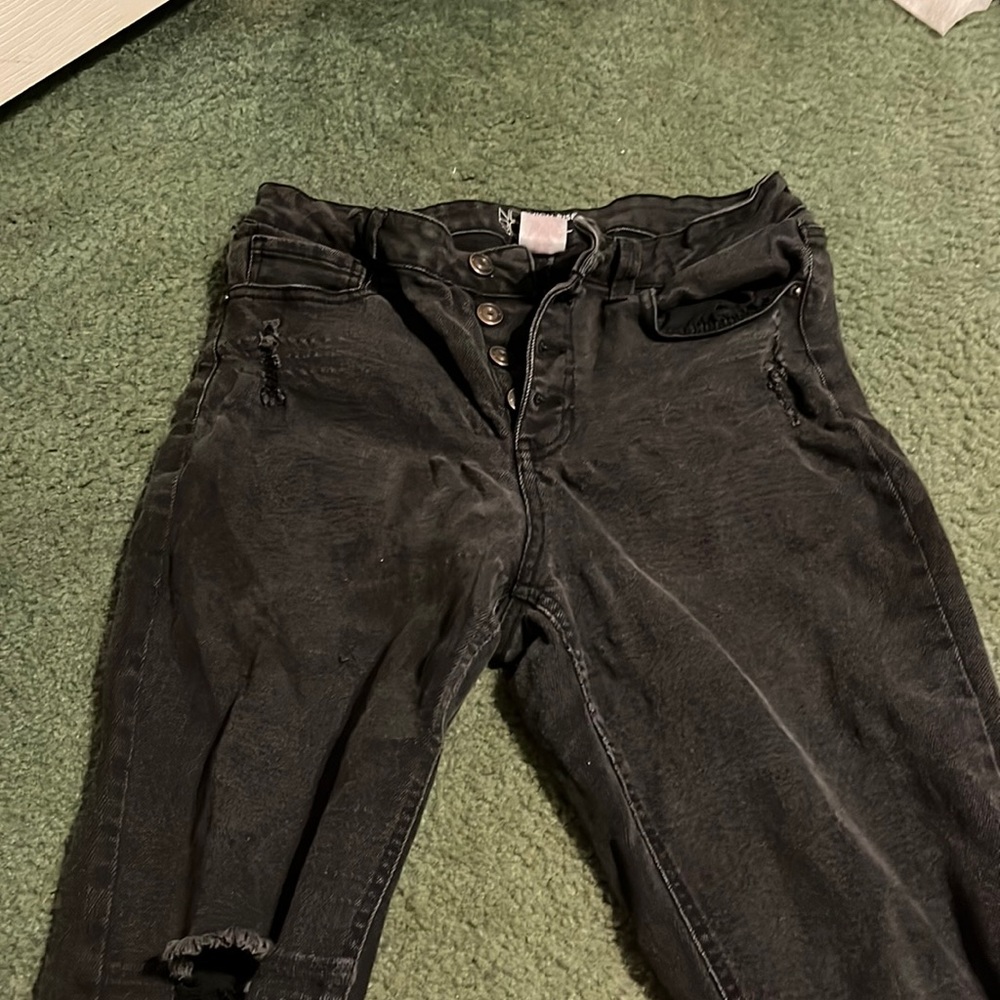 Women’s jeans. They have rips. Nothings wrong with them. High rise skinny.